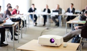 Proposal for a Scalable Review Model with an In-Person PC Meeting